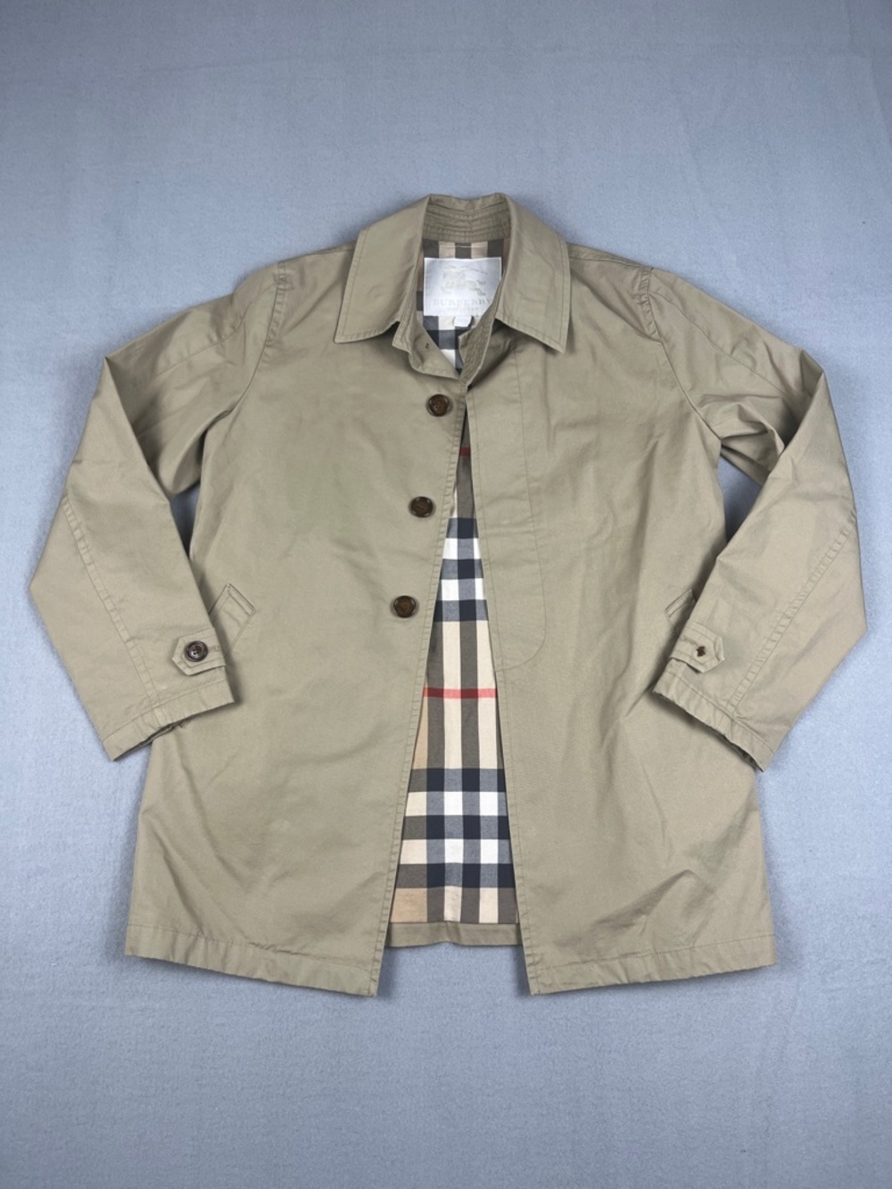 Children’s Burberry Khaki Trench Coat with Signature Check Lining
Size: 12Y